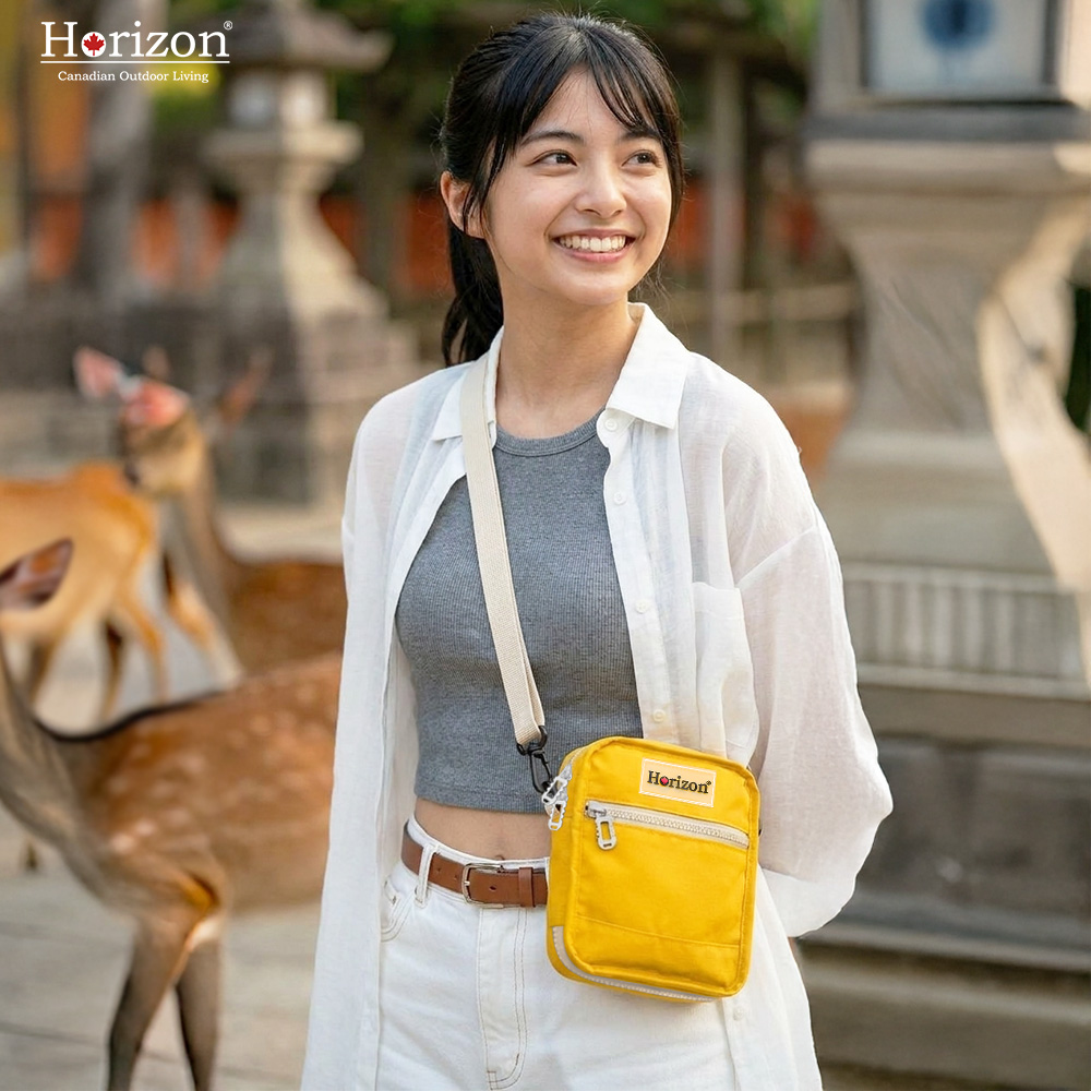 Yellow Horizon Toastie Crossbody Bag styled as a compact urban everyday carry bag